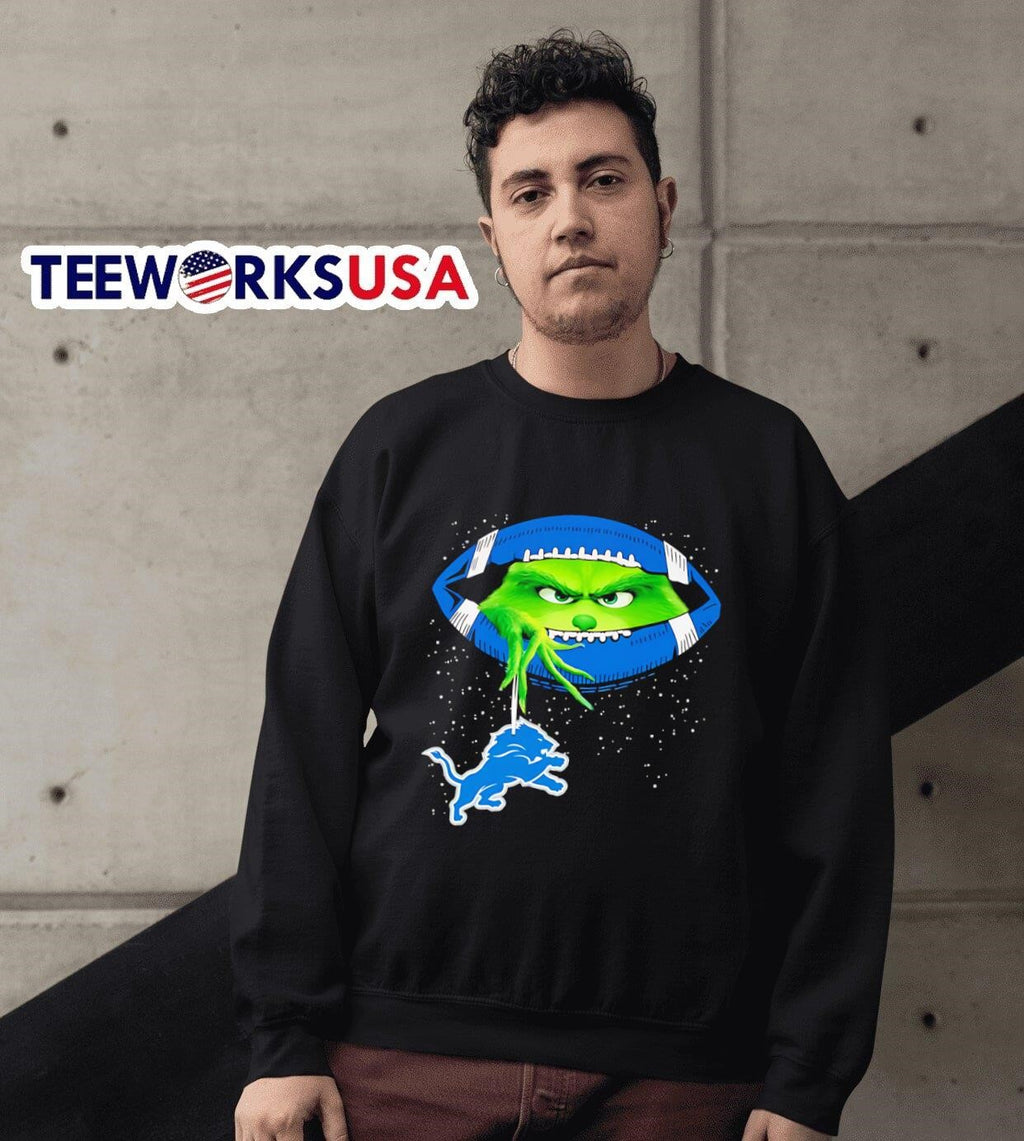Grinch holding Detroit Lions football logo - Adult & Kids T-Shirts, Sweatshirts & Hoodies apparel design preview 3